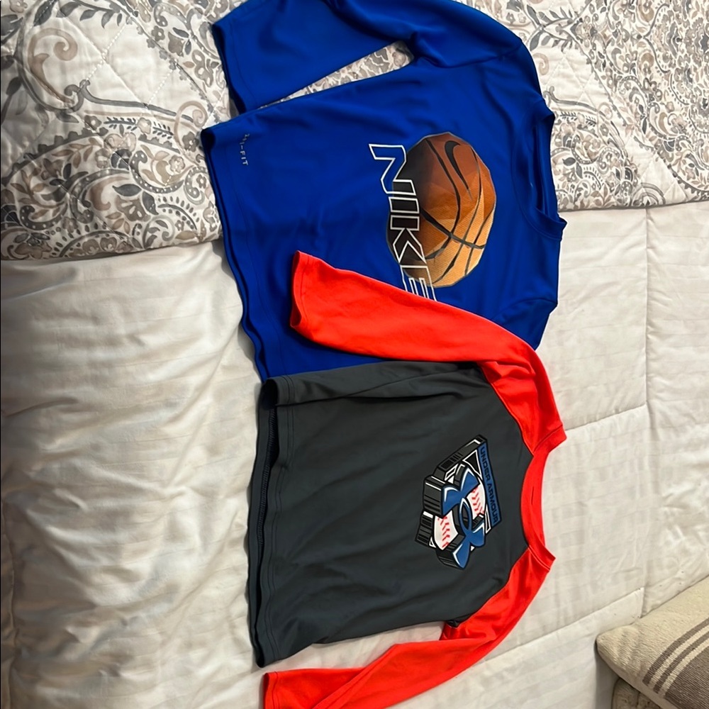 Nike and Under Armour shirt duo